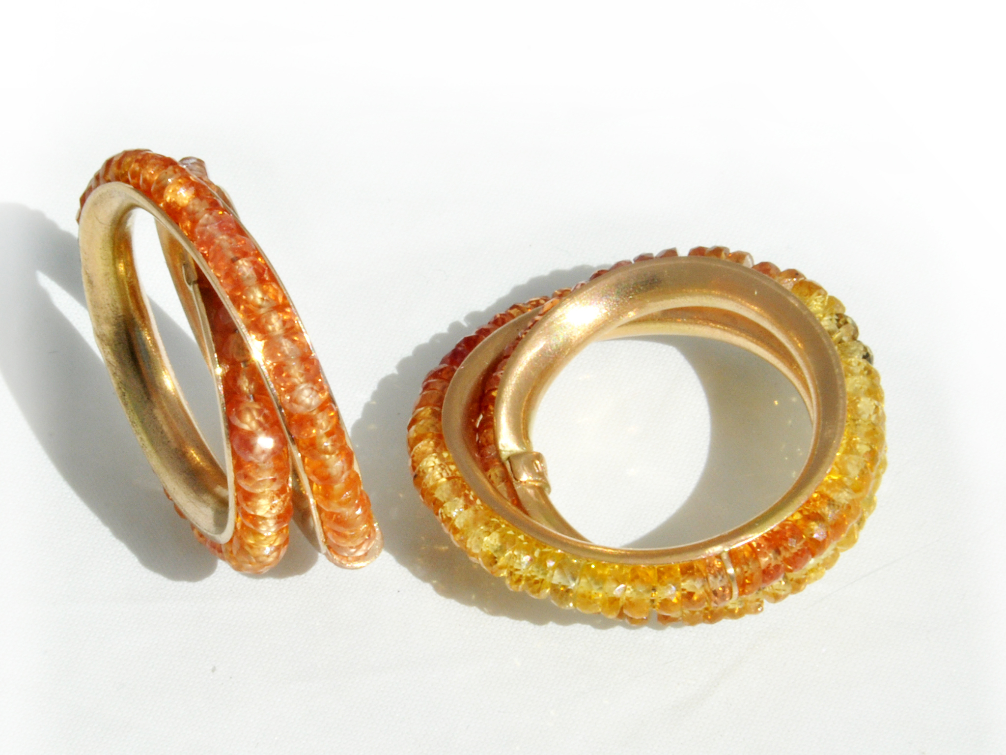 Wickelringe und Collier mit orangenen Safiren 1 Wickelringe mit orangenen Safiren