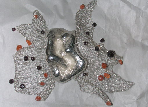 Armreif mit gestrickten Flügeln 3 Armreif mit gestrickten Flügeln